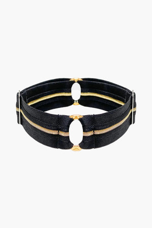 One black elastic tape garters with golden shimmer and metal loop decorations