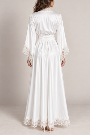 Back view of the V.I.P.A Milady long off-white satin kimono dress with lace-trimmed sleeves and hem