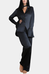 Model wearing the V.I.P.A Royal Sapphire black satin shirt with matching satin trousers