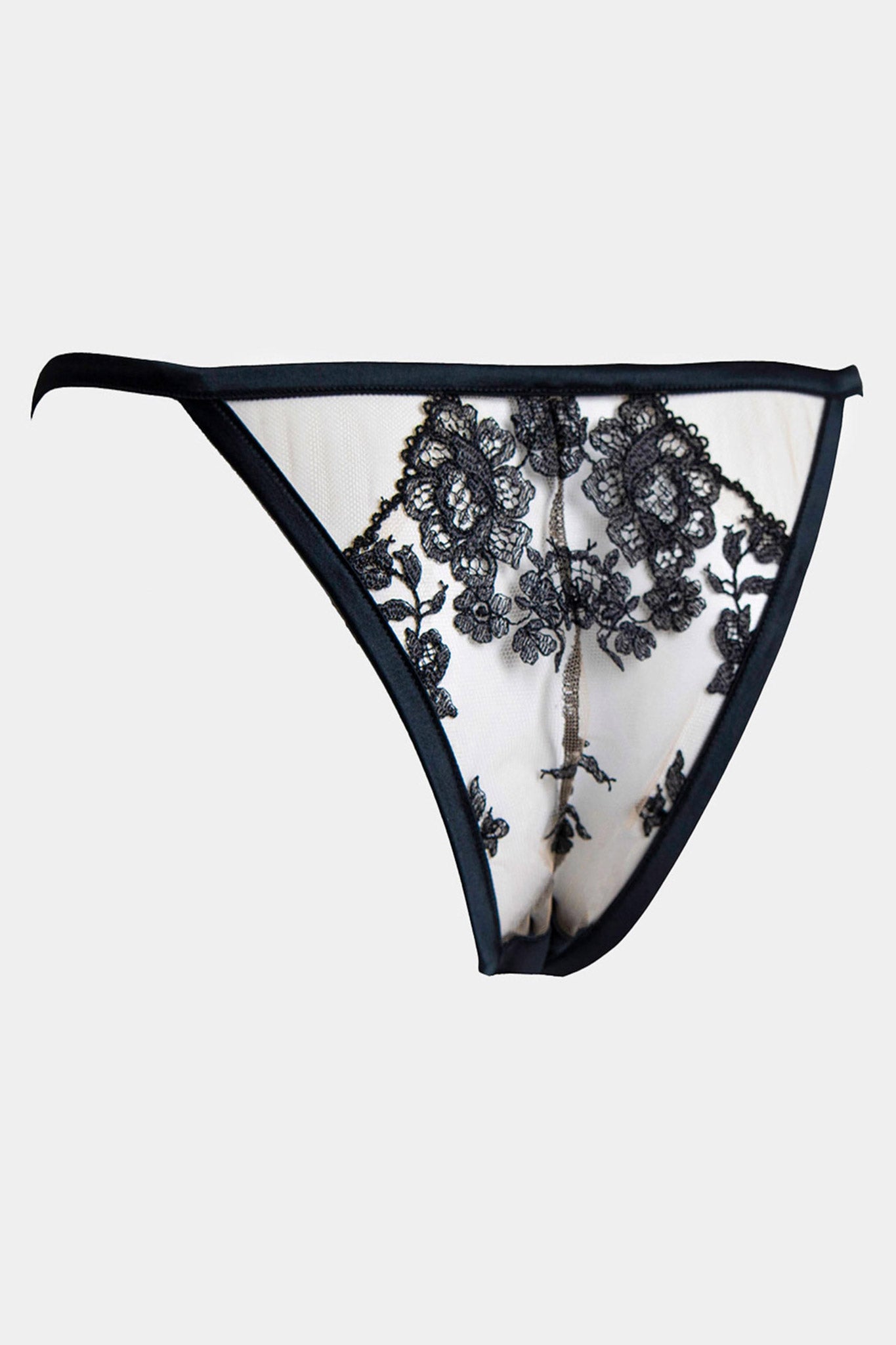 A black Brazilian lace panty with floral embroidery and silky satin fabric. It features adjustable satin tapes with gold accessories.