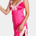 Model wearing the V.I.P.A Mozart pink satin nightdress with milk lace V-neck and slit