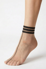 Foot wearing a V.I.P.A Elita nude sheer mesh sock with black striped band